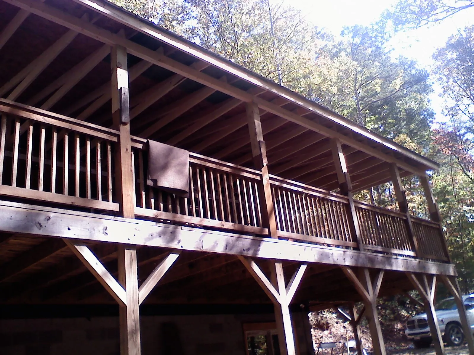 Timber framing under a new elevated porch and deck — Roof Leak Repair in Painter by Roofing Brothers